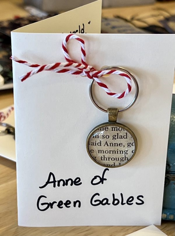 Anne of Green Gables Keychain - "Dear old world," she murmered, "You are very lovely, and I am glad to be alive in you."  Anne