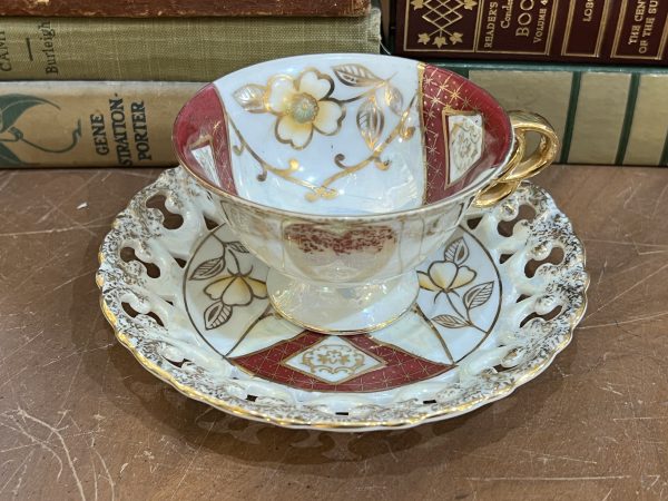 Beautiful Golden Flowers with Burgundy Design with Lattice Edging on Saucer