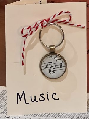 Music Keychain with Gift Card - "Beautiful music is the art of the prophets that can calm the agitations of the soul; it is one of the most magnificent and delightful presents God has given us," quote by Martin Luther (1483-1546)